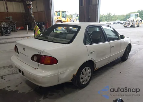 2001 Toyota Corolla Le z USA, uszkodzony, nr VIN 2T1BR12E11C473152